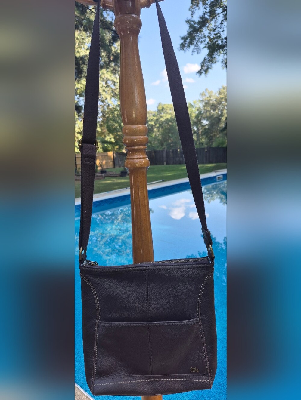 The Sak Dark Brown Pebbled Leather Crossbody bag w/ front slip pocket